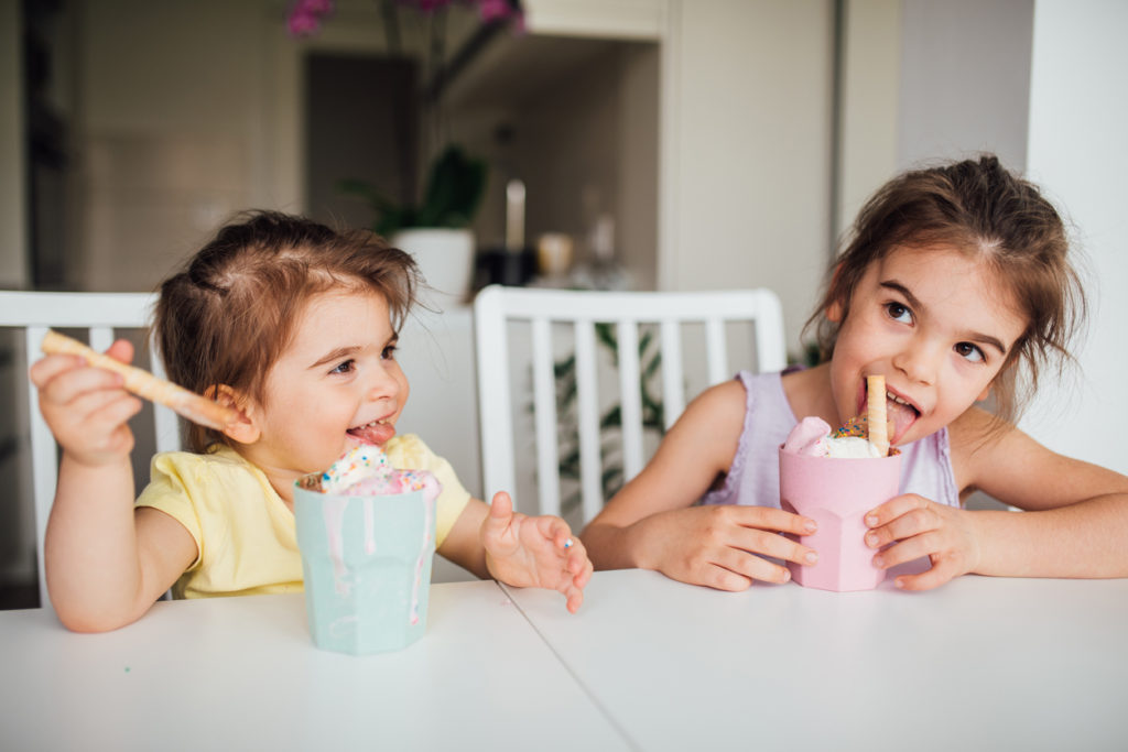 Siblings eating ice cream