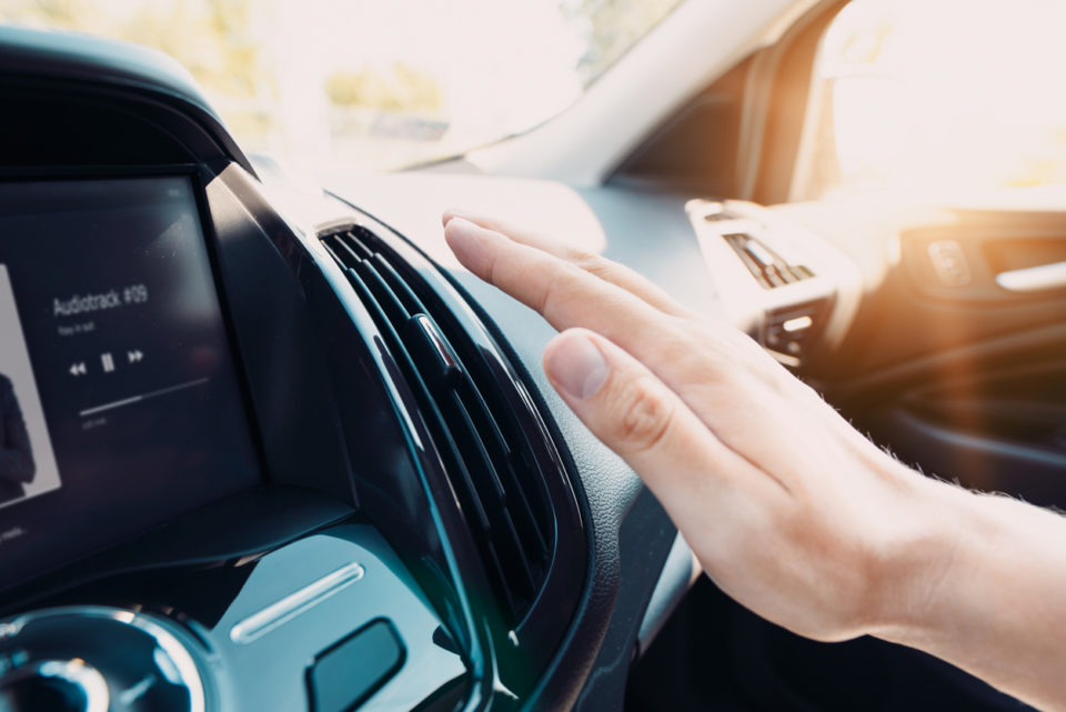 Hand checking the car heater